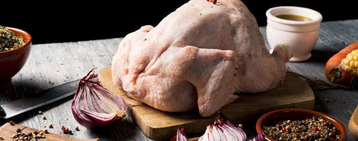 raw turkey on a cutting board