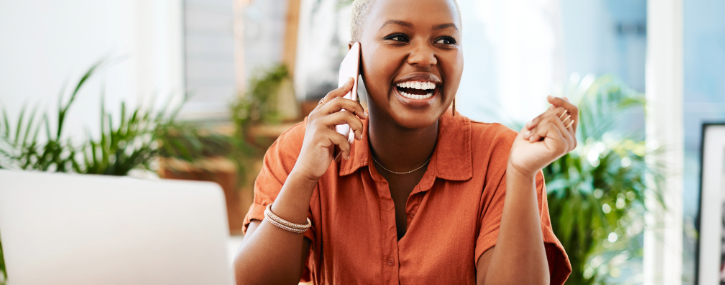 a woman is on the phone with a lender