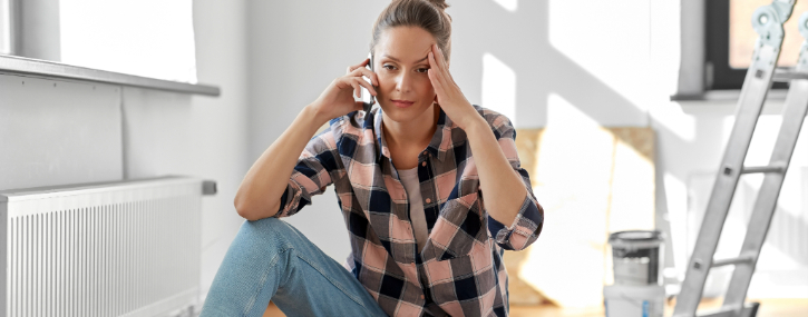 a seemingly stressed out woman is on the phone 