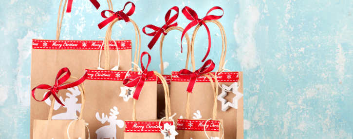 Gifts in bags decorated for Christmas